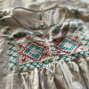 Small embroidered tunic shirt